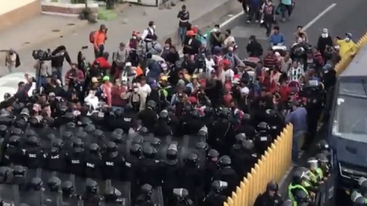 Choque entre migrantes y policías de CDMX deja 17 lesionados